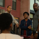 Luke Cage being confronted by a number of his neighbors.